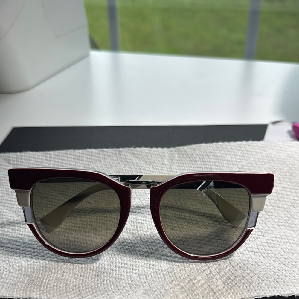 Chic Burgundy Authentic Sunglasses by Fendi.  Gently loved.